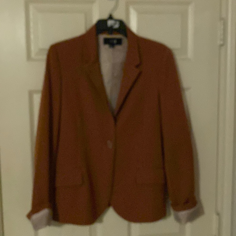 Women’s blazer size large, size large like new worn one time.